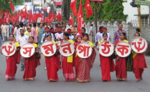 Communist Party of India-Marxist (CPI-M) workers during a rally in Siliguri on April 14, 2014. (Photo: IANS)
