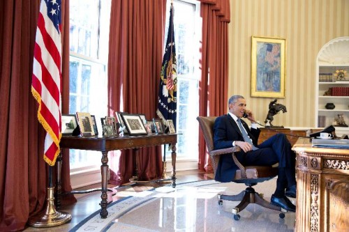 Photo released by the White House shows U.S. President Barack Obama talking on the phone with Alan Gross who was en route to the U.S. from Cuba after being released, in the Oval Office of the White House in Washington Dec. 17, 2014.