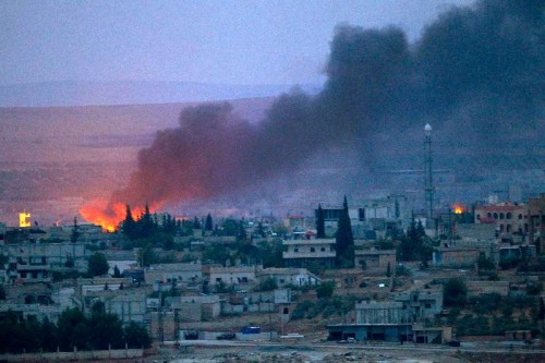 Smoke rises after an US airstrike on positions of Islamic State (IS) terror group in Kobani, Syria.The airstrikes initiated by a US-led coalition against IS continued in the southtern part of Syrian border city of Kobane.