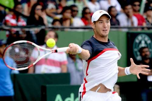 Lajovic D of Serbia in action against Somdev Devvarman of India during Davis Cup match between India and Serbia at KSLTA Stadium, in Bangalore 