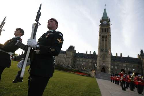 Soldiers perform during a ceremony marking the 100th anniversaries of the Princess Patricia's Canadian Light Infantry and the Royal 22nd Regiment, on Parliament Hill in Ottawa, Canada