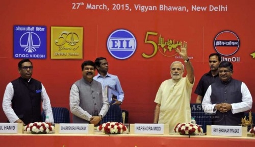 Prime Minister Narendra Modi at the 'Urja Sangam', a summit dedicated to energy, in New Delhi on March 27, 2015. Also seen the Union Minister for Communications and Information Technology Ravi Shankar Prasad and the Union Minister of State for Petroleum and Natural Gas (Independent Charge) Dharmendra Pradhan.