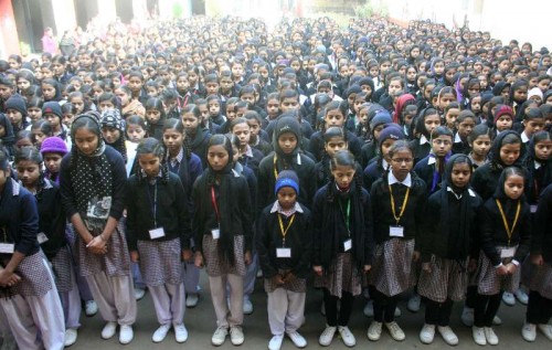 Students participate in a silent protest against Tuesday's attack on the Army Public School in Peshawar, Pakistan, that claimed 104 lives mostly those of children in Varanasi, on Dec 17, 2014. 