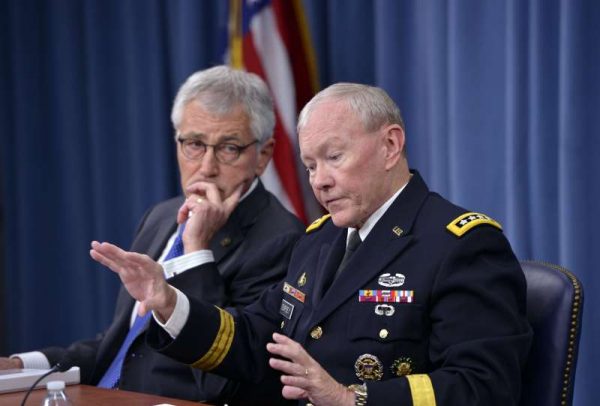 US Secretary of Defense Chuck Hagel (L) and Chairman of the Joint Chiefs of Staff General Martin Dempsey hold a press briefing at the Pentagon in Washingto