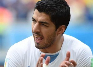 Uruguay's Luis Suarez applauds before a Group D match between Italy and Uruguay of 2014 FIFA World Cup at the Estadio das Dunas Stadium in Natal, Brazil