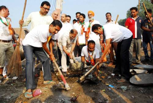 BJP workers participate in `Swachh Bharat Abhiyan` - a cleanliness drive initiated by Prime Minister Narendra Modi in Amritsa