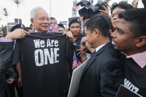  Malaysian Prime Minister Najib Razak meets with protestors outside the Parliament in Kuala Lumpur, Malaysia. Najib Razak on Wednesday condemned the shotdown of MH17, calling on all parties to work together to ensure investigations were completed immediately. 