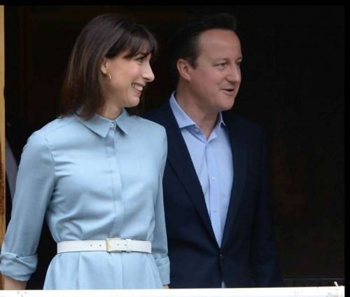 British Prime Minister David Cameron and wife Samantha on way to cast their vote