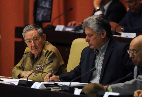 Cuba's President Raul Castro and Cuban first Vice President Miguel Diaz-Canel (C) participate in the 4th Ordinary Session of the 8th Legislature of the National Assembly of People's Power (Parliament), at the Palace of Conventions, in Havana, Cuba, on Dec. 19, 2014. According to local press, Cuban Parliament on Friday unanimously approved a declaration of support for the speech of Raul Castro on relations between the United States and Cuba. 