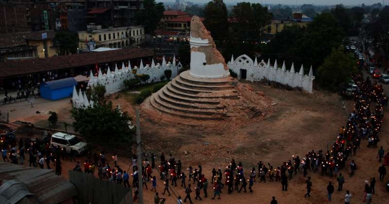 Nepalese  participate in a candlelight vigil for victims in earthquake in Kathmandu, Nepal