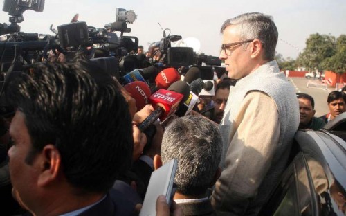 Jammu and Kashmir Chief Minister Omar Abdullah talks to press after tendering his resignation to Jammu and Kashmir Governor N.N. Vohra in Jammu on Dec 24, 2014. 