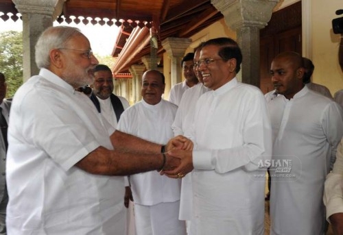 Prime Minister Narendra Modi with Sri Lankan President Maithripala Sirisena during his visit to the Sri Maha Bodhi Tree in Anuradhapura, Sri Lanka on March 14, 2015.