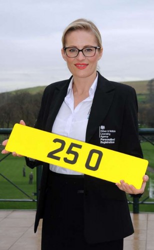 Jody Davies, DVLA Personalised Registrations’ Head of Events, with registration 25 O which sold for British record £518,000