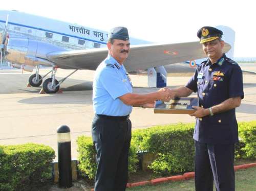 The Air Officer Commanding in Chief Western Air Command, Air Marshal S.S. Soman hands over the symbolic key to the Chief of Bangladesh Air Force, Air Marshal Muhammad Enamul Bari, during the Dakota aircraft presentation ceremony, at Palam, in New Delhi