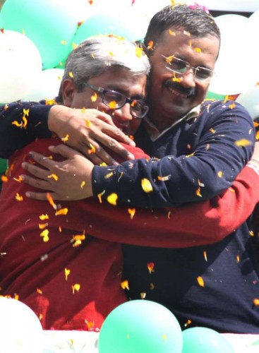  Aam Aadmi Party (AAP) leaders Arvind Kejriwal and Ashutosh celebrate party's performance in the recently concluded Delhi Assembly Polls in New Delhi, on Feb 10, 2015. 