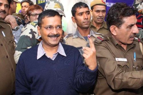  AAP`s Chief Arvind Kejriwal after cast his vote at SGTB Khalsa, polling booth in New Delhi on Feb 07, 2015. 