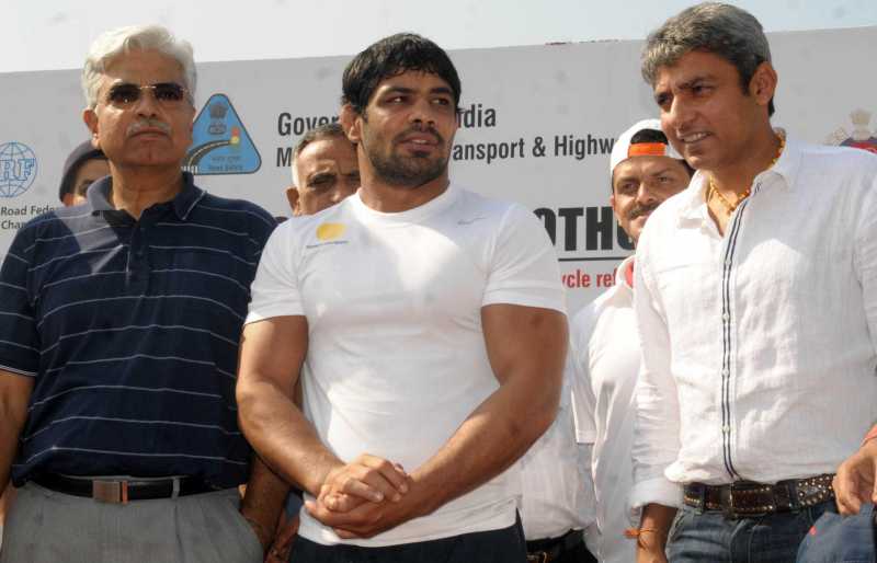 Indian wrestler Sushil Kumar with Former Indian cricketer Ajay Jadeja and Delhi Police Commissioner B.S. Bassi 