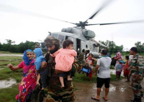 The Indian Air Force Helicopters carrying out rescue, relief and evacuation of people marooned during the flood fury, in Jammu and Kashmir.