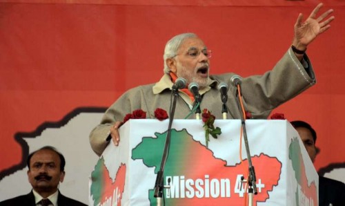  Prime Minister Narendra Modi addresses a rally at Shar-e-Kashmir Cricket Stadium in Srinagar, on Dec 8, 2014. 