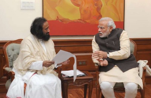 Sri Sri Ravi Shankar calls on the Prime Minister Narendra Modi, in New Delhi