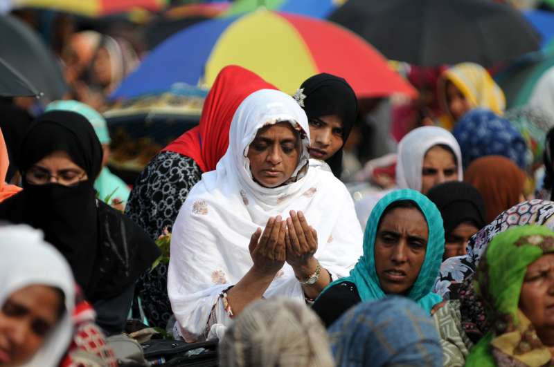  Pakistani supporters of religious leader Tahir-ul-Qadri participate in Friday prayers held at an anti-government protest site in front of Parliament in Islamabad capital of Pakistan 