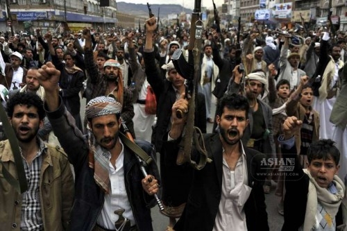 Supporters of the Shiite Houthi group shout slogans during a rally in Sanaa, Yemen, on March 26, 2015. The Shiite Houthi group organized a demonstration in Sanaa to denounce the air raid led by Saudi Arabia against the group in the capital and several other cities in Yemen