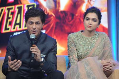 Actors Shahrukh Khan and Deepika Padukone during the music launch of film Happy New Year in Mumbai on Sept 15, 2014.