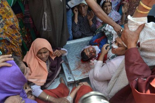 The body of Mehraj-ud-Din Dar, who was shot dead by unidentified gunmen in Sopore town of Jammu and Kashmir on June 14, 2015.