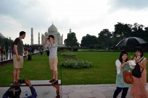 Foreign tourists enjoy themselves at Taj Mahal in Agra