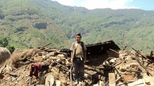 Ran Bahadur Gurung,74, stands amid the rubble which once was his home in a picturesque village of Gurkha.
