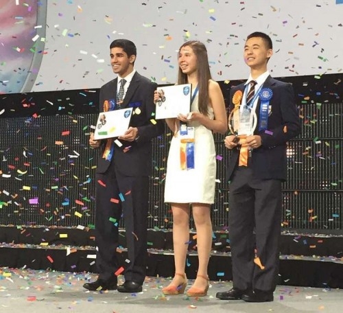 Karan Jerath, 18, (left) of Friendswood, Texas, received the Intel Foundation Young Scientist Award of ,000 for refining and testing a novel device that should allow an undersea oil well to rapidly and safely recover following a blowout. With him, at the Intel International Science and Engineering Fair award ceremony, in Pittsburgh on Friday, May 15, are Nicole Ticea, 16,(cneter) of Canada, who won the other Young Scientist Award, and Raymond Wang, 17, (right) also of Canada, received the Gordon E. Moore Award of ,000.