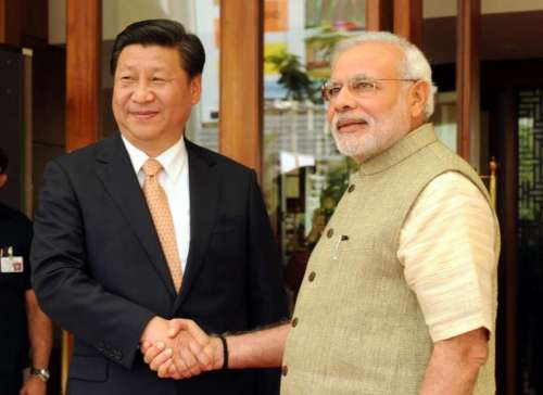 The Prime Minister, Shri Narendra Modi welcoming the Chinese President, Mr. Xi Jinping, at Hyatt Hotel, Ahmedabad