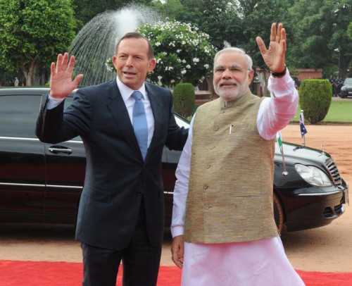 The Prime Minister, Shri Narendra Modi with the Prime Minister of Australia, Mr. Tony Abbott, at the Ceremonial Reception, at Rashtrapati Bhavan, in New Delhi