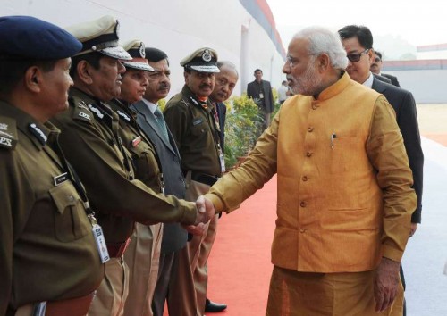 The Prime Minister, Shri Narendra Modi meeting the DGPs at the All India Conference of DGP/IGP, at Guwahati on November 30, 2014. The Minister of State for Home Affairs, Shri Kiren Rijiju is also seen.