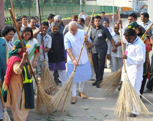 The Prime Minister, Shri Narendra Modi launching the cleanliness drive for Swacch Bharat Mission from Valmiki Basti, in New Delhi. FILE PHOTO