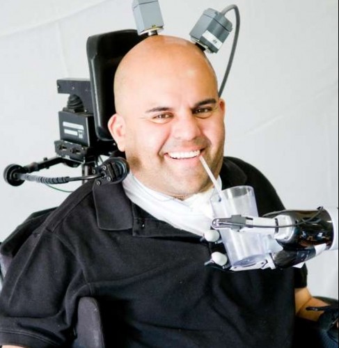 The paralysed patient can now perform a fluid hand-shaking gesture and even play “rock, paper, scissors” using a separate robotic arm. (Photo: Courtesy, Spencer Kellis and Christian Klaes/Caltech)