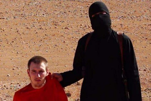 Jihadi John with one of his victims  