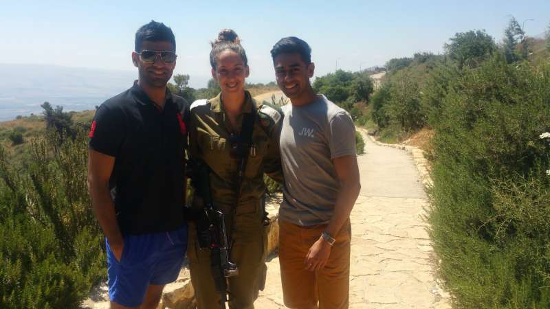 Pranav Bhanot and Ameet Jogia with a member of israeli Defence Force