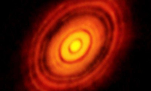 This image sparked scientific debate with researchers arguing over whether newly forming planets were responsible for gaps in the dust and gas swirling around the young star