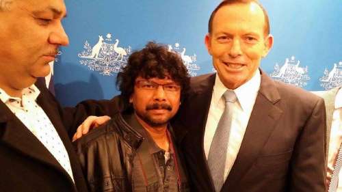 Painter Prabhakar being congragulated by Australian Prime Minister Tony Abbot, when he was told of his painting.