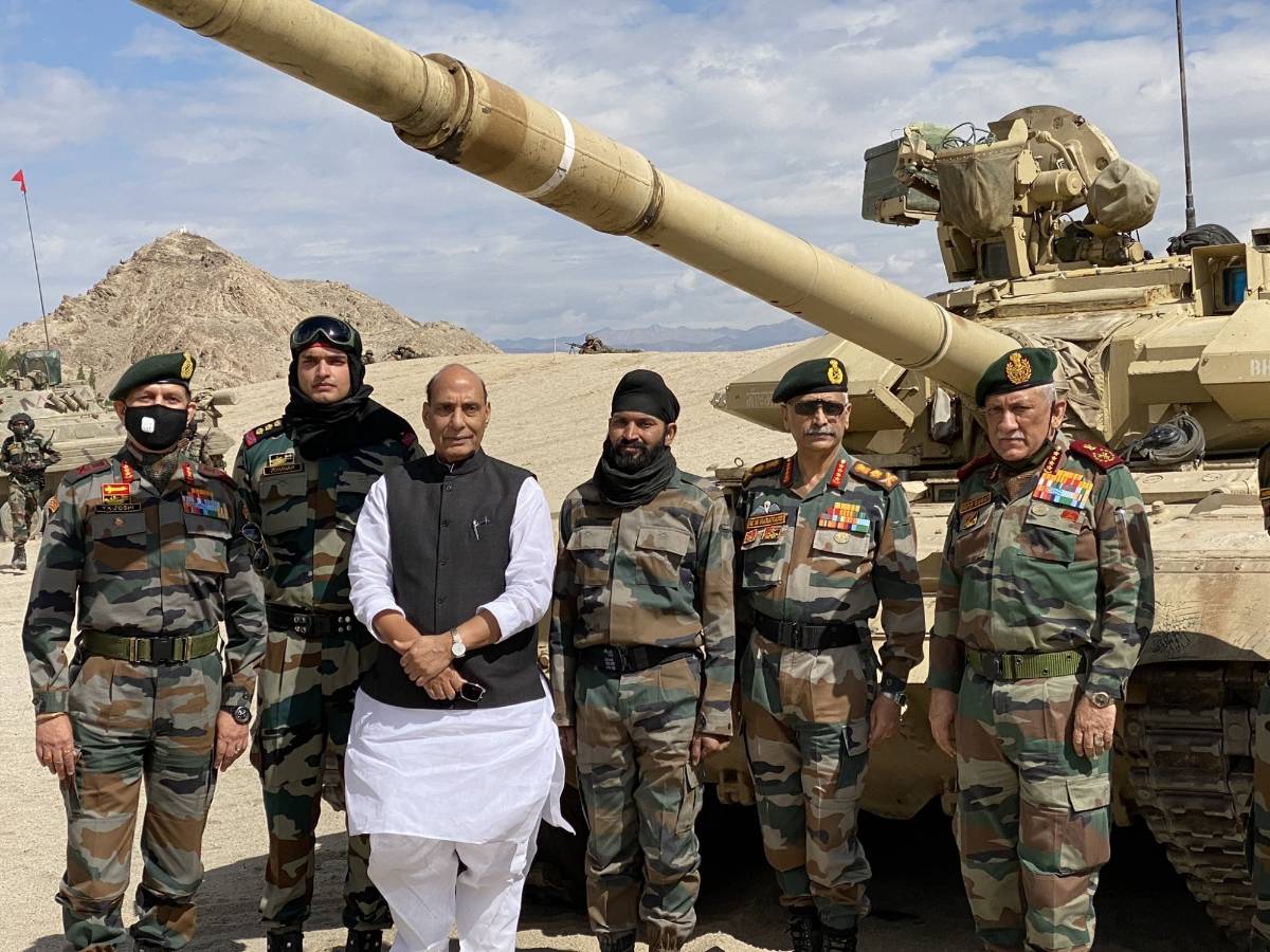 Leh: Defence Minister Rajnath Singh with the troops who participated in the para dropping and other military exercises at Stankna near Leh on July 17, 2020. Also seen Chief of Defence Staff General Bipin Rawat and Army Chief General Manoj Mukund Naravane. (Photo: IANS) by . 