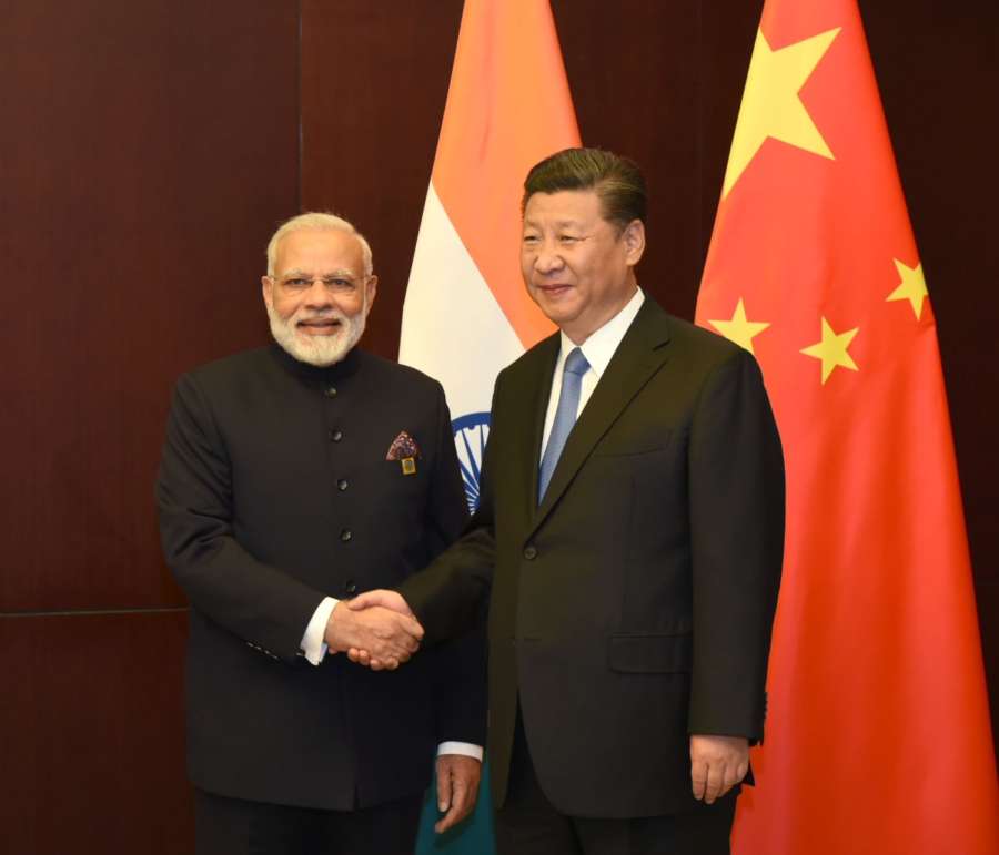 Kazakhstan (Astana): Prime Minister Narendra Modi meets the President of the People`s Republic of China, Xi Jinping, on the sidelines of the SCO Summit, in Astana, Kazakhstan on June 09, 2017. (Photo: IANS/PIB) by . 