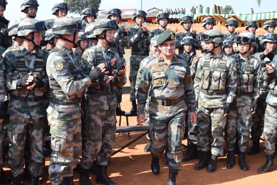 Shillong: Soldiers of the Indian and the Chinese Army during the closing ceremony of the eighth edition of India-China Joint Training Exercise "Hand-in- Hand" 2019, at Joint Training Node, Umroi Miitary Station in Meghalaya's capital Shillong on Dec 20, 2019. (Photo: IANS/DPRO) by . 