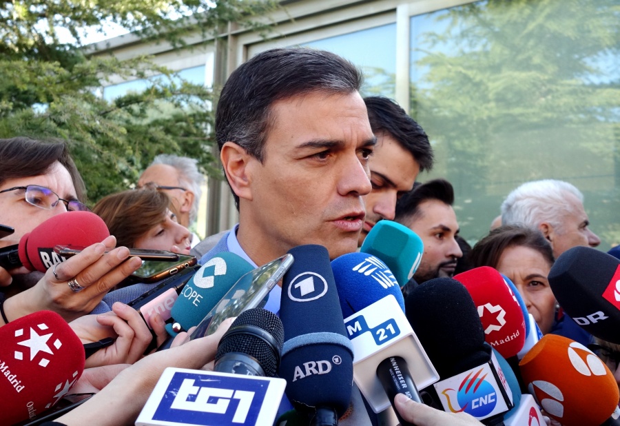 MADRID, April 28, 2019 (Xinhua) -- Spanish Prime Minister Pedro Sanchez (C) speaks to media after casting his ballot at a polling station in Madrid, Spain, April 28, 2019. Spain's polling stations opened on Sunday at 09:00 local time (0700 GTM) for the country's third general election in four years. Close to 37 million voters are called to cast their votes in over 23,000 polling stations located in thousands of municipalities across Spain. (Xinhua/Guo Qiuda/IANS) by . 