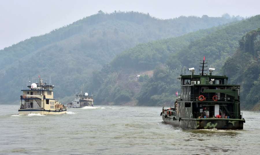 BEIJING, Nov. 21, 2018 (Xinhua) -- Joint patrol vessels with law enforcement personnel from China, Thailand, Laos and Myanmar, sail on the Lancang-Mekong River, March 17, 2015. The 76th Mekong River joint patrol led by China, Laos, Myanmar, and Thailand started Nov. 20, 2018 from Guanlei Port, Xishuangbanna Dai Autonomous Prefecture in southwest China's Yunnan Province. According to Yunnan border police bureau, the joint patrol will last five days and cover a range of over 500 kilometers to enhance anti-terrorism capability, safeguard the security and crack down on cross-border crimes. Once every month since 2011, the patrols targeting drug trafficking, smuggling and other cross-border crimes along the Mekong, conduct random inspections in waters near key regions, including the Golden Triangle.The Mekong River, known as the Lancang River at the Chinese stretch, runs through China, Laos, Myanmar, Thailand, Cambodia and Vietnam. It is an important waterway for transnational shipping and a border area known for criminal activities. For seven years, security cooperation between the four countries has been getting closer with joint patrols a regular monthly phenomenon. The patrol includes anti-terrorism drills, police skill practices and anti-drug campaigns. Since December 2011, the joint patrols have covered more than 39,500 kilometers, with 122 merchant ships rescued and 582.28 kilograms of drugs seized. The cooperation has expanded to the cracking down on terrorism and human trafficking, as well as joint search and rescue. (Xinhua/Chen Haining/IANS) by . 