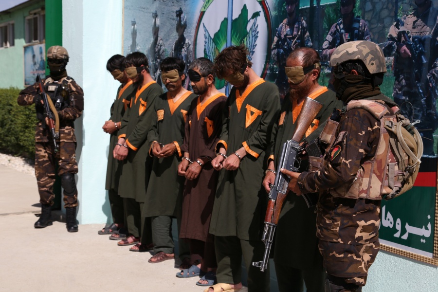 GHAZNI, June 28, 2020 (Xinhua) -- Militants stand handcuffed after being arrested in Ghazni province, eastern Afghanistan, June 28, 2020. Ten militants have been killed as warplanes struck a Taliban gathering in Afghanistan's eastern Ghazni province on Sunday, provincial government spokesman Wahidullah Jumazada said. The security forces also captured six more militants from Ghazni city, the provincial capital, and its surrounding areas over the past couple of days. (Photo by Sayed Mominzadah/Xinhua/IANS) by . 