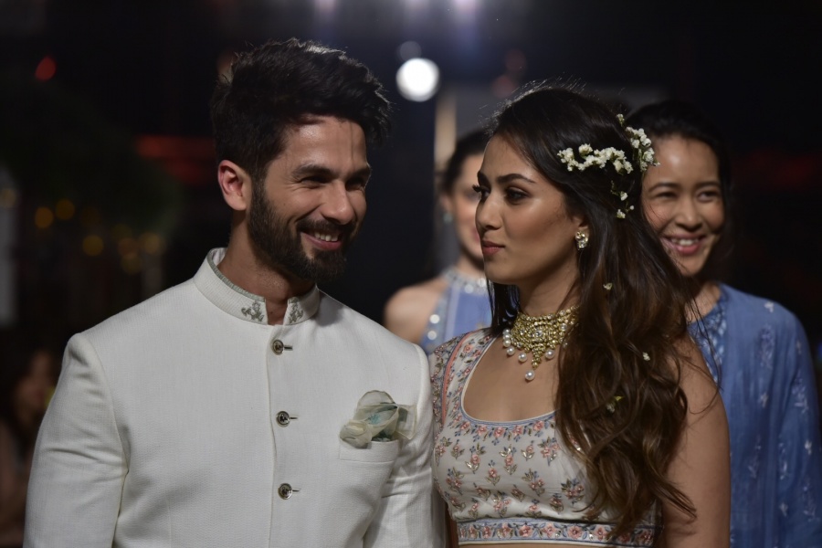 Mumbai: Actor Shahid Kapoor with his wife Mira Rajput walk the ramp for fashion designer Anita Dongre during the Lakme Fashion Week Summer/Resort 2018 in Mumbai on Jan 31, 2018. (Photo: IANS) by . 