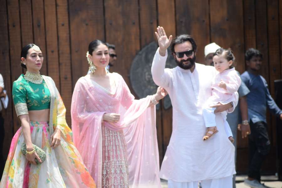 Mumbai: Actresses Karisma Kapoor and Kareena Kapoor Khan along with her husband Saif Ali Khan and son Taimur during wedding ceremony of Sonam Kapoor and Anand Ahuja in Mumbai on May 8, 2018. (Photo: IANS) by . 